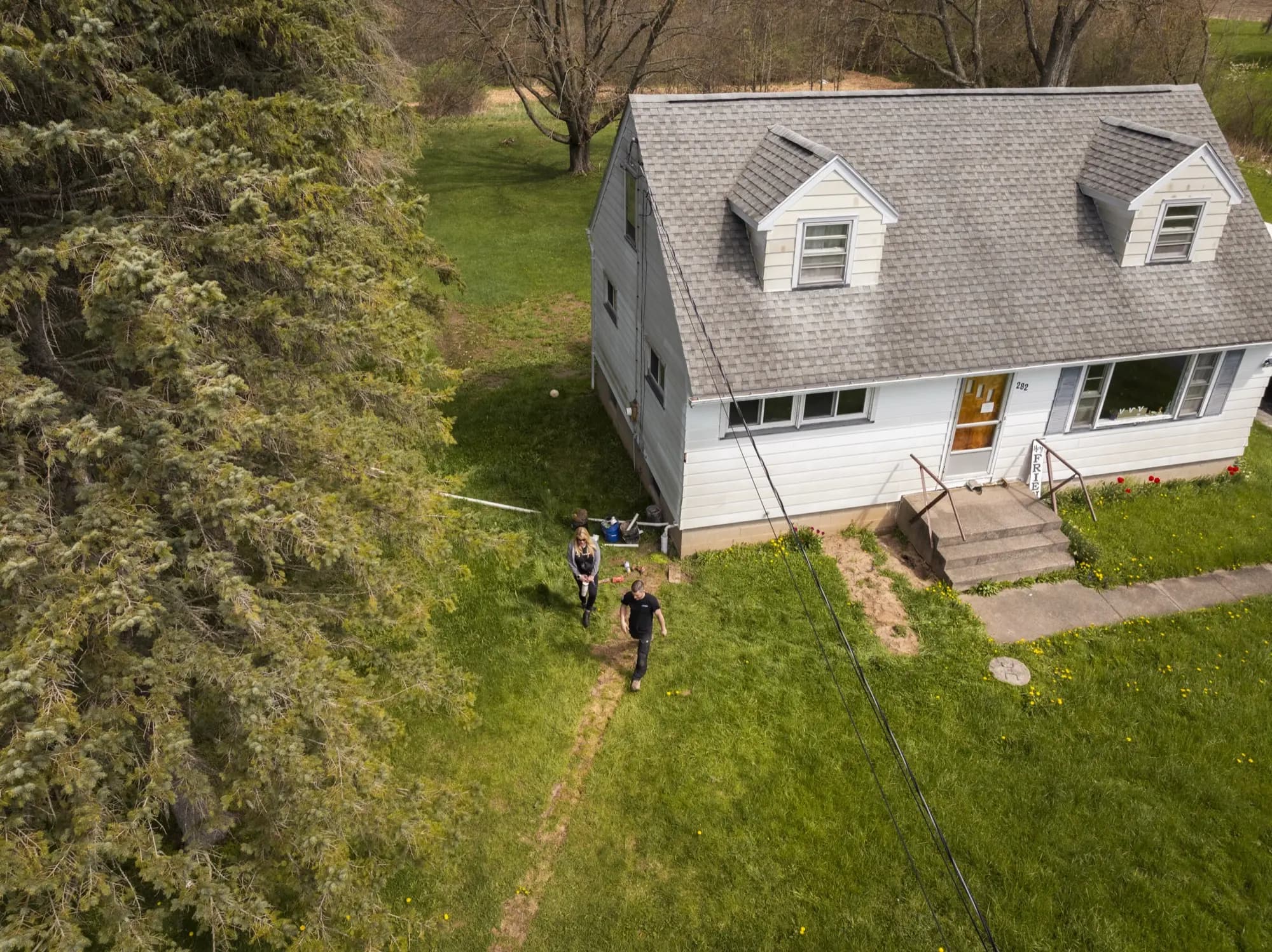 Aerial view of discharge line installation away from home