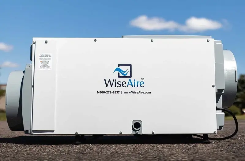 WiseAire 95 dehumidifier unit with ducted vents on pavement